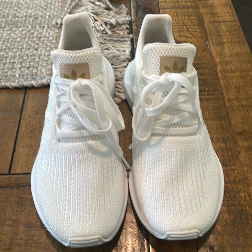 All white Adidas tennis shoes, size 6 1/2 women worn one time